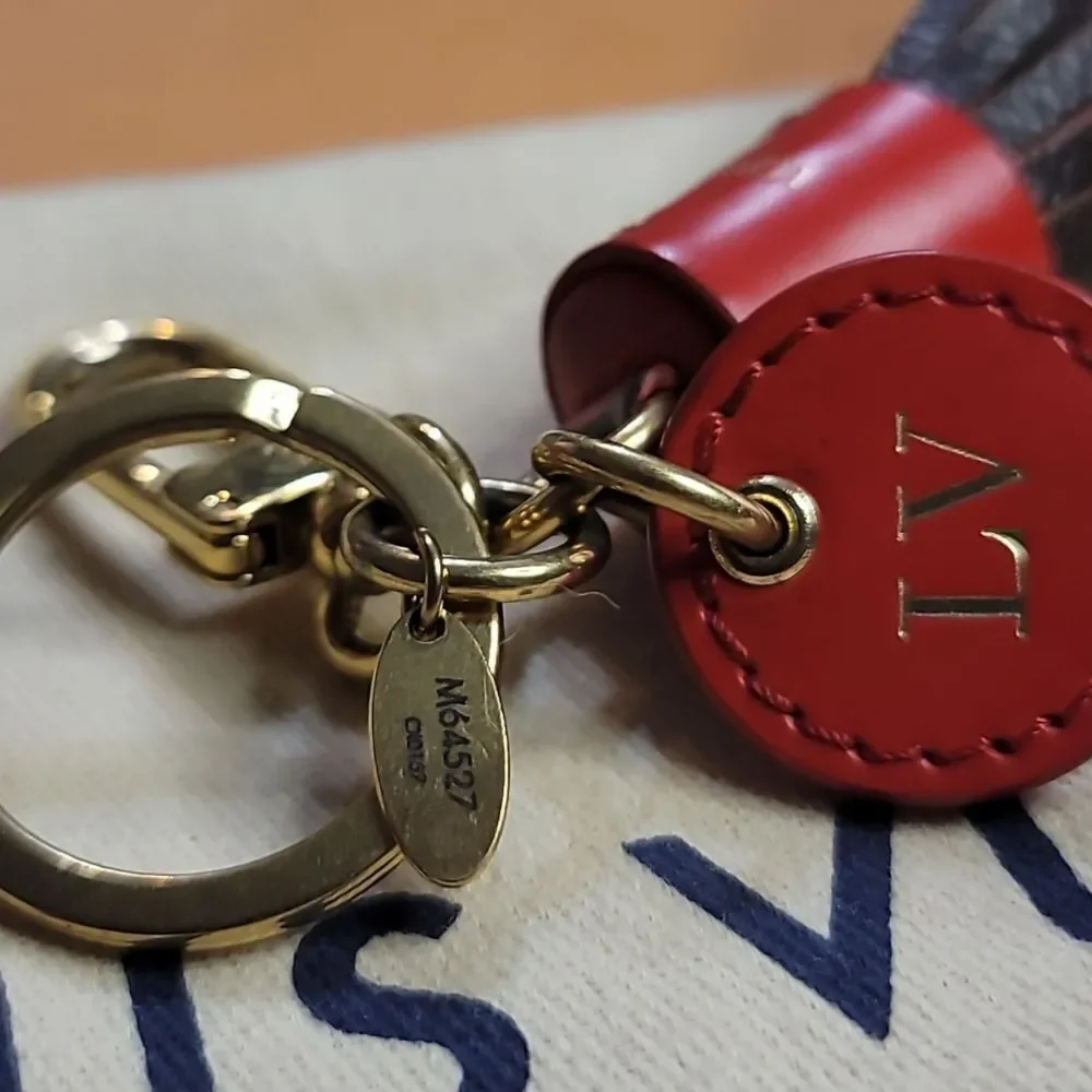Louis Vuitton Leather Tassel Keychain In EUC FULL INCLUSION